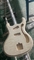 オーダーメイド モスライト 電気ギター JRM ジョニー・ラモーン 緑色の水波付きギター サプライヤー
