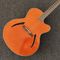 6弦のギター オレンジ色 赤い背中と横 サプライヤー