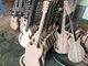 V形6弦の電気ギター 白いボディ 金色 ハードウェア フィンガーボードエボニー 送料無料 サプライヤー